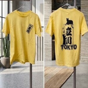 Vibrant Yellow Short Sleeve Tee with a Tokyo Cats Graphic